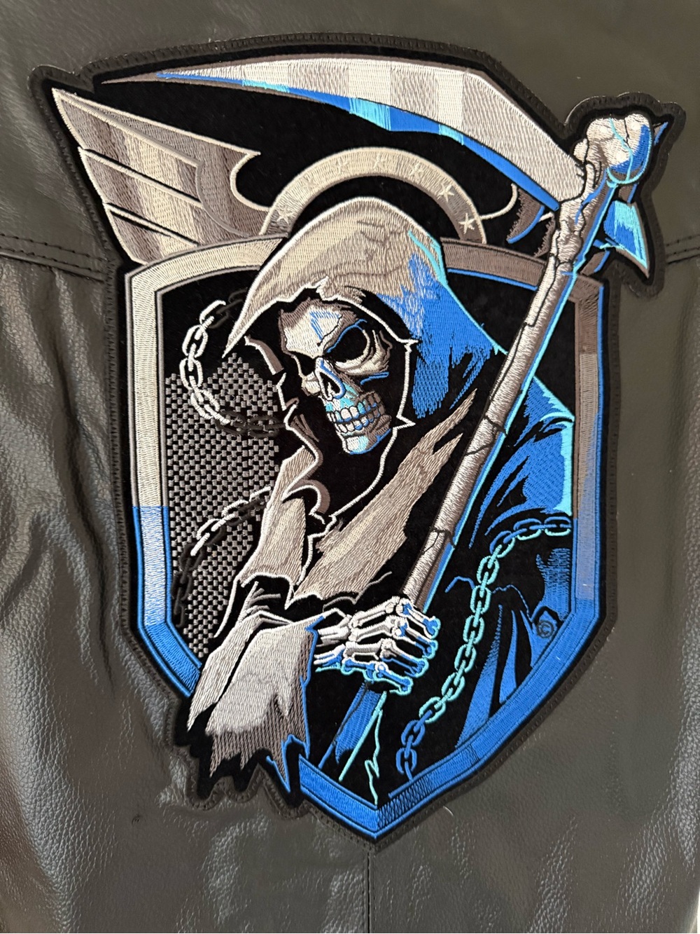 Women’s Black Leather Jacket with Blue & Gray Embroidered Grim Reaper Patch